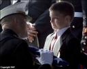 8 Year Old Christian Golczynski Accepts the Casket Flag of His Father